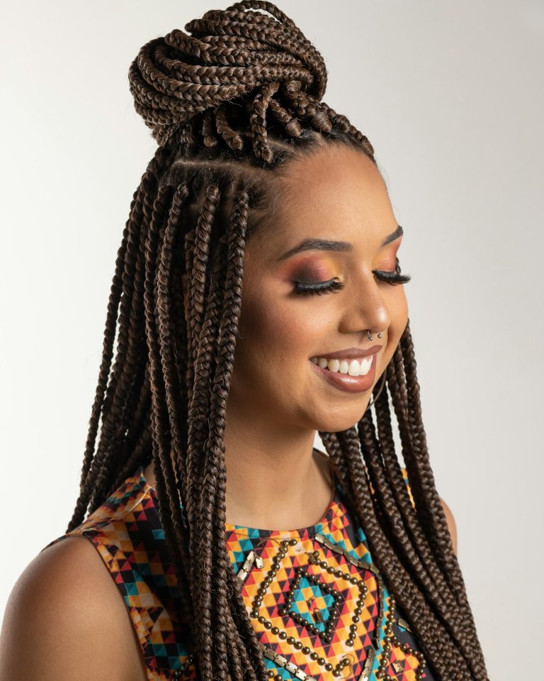 Medium knotless braids on a smiling client, medium knotless braids San Diego