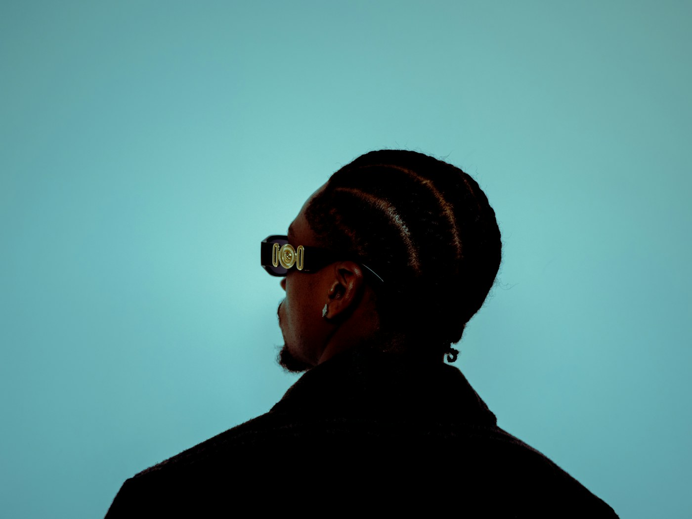 Man wearing cornrow braids, mens braids San Diego
