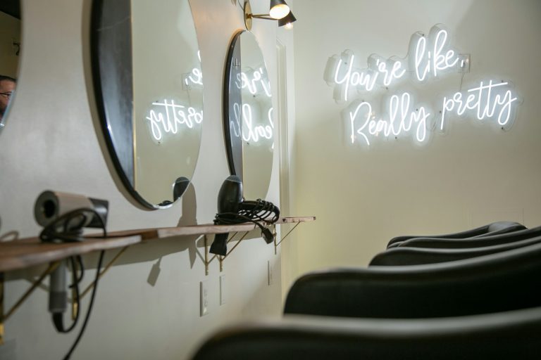 Styling chairs inside a 24 hour braiding salon in San Diego