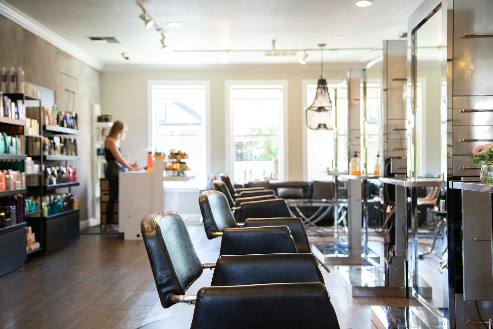 Bright modern braiding salon interior in San Diego